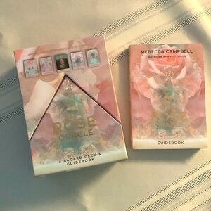 The Rose Oracle by Rebecca Campbell card deck and guidebook .
